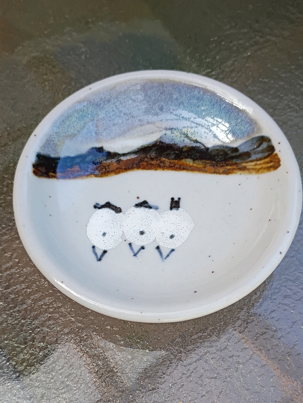 Handcrafted White Ceramic Dish with Blue and Brown Accent